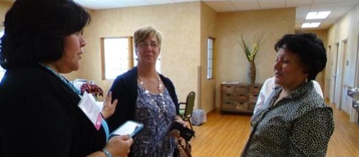 Home Services Manager Patricia Lucero (R) chats with Randella Bluehouse (NICOA Executive Director) and Susan Chapman (NICOA SCSEP Program Director)