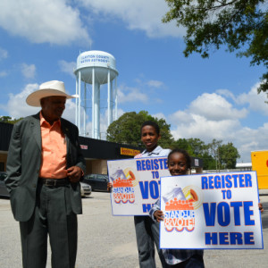 Charles “Chuck” Ware, now 86, is seen with two friends who were encouraging people to register to vote in September 2014 in Clayton County, Georgia, which is south of Atlanta. Ware is a straight talker who loves to engage people about voting. Equal Voice News Photo by Brad Wong 