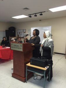 Shyconia Burden of USCIS answers questions from listening session participants about citizenship and immigration. Photo by Meera Nair.